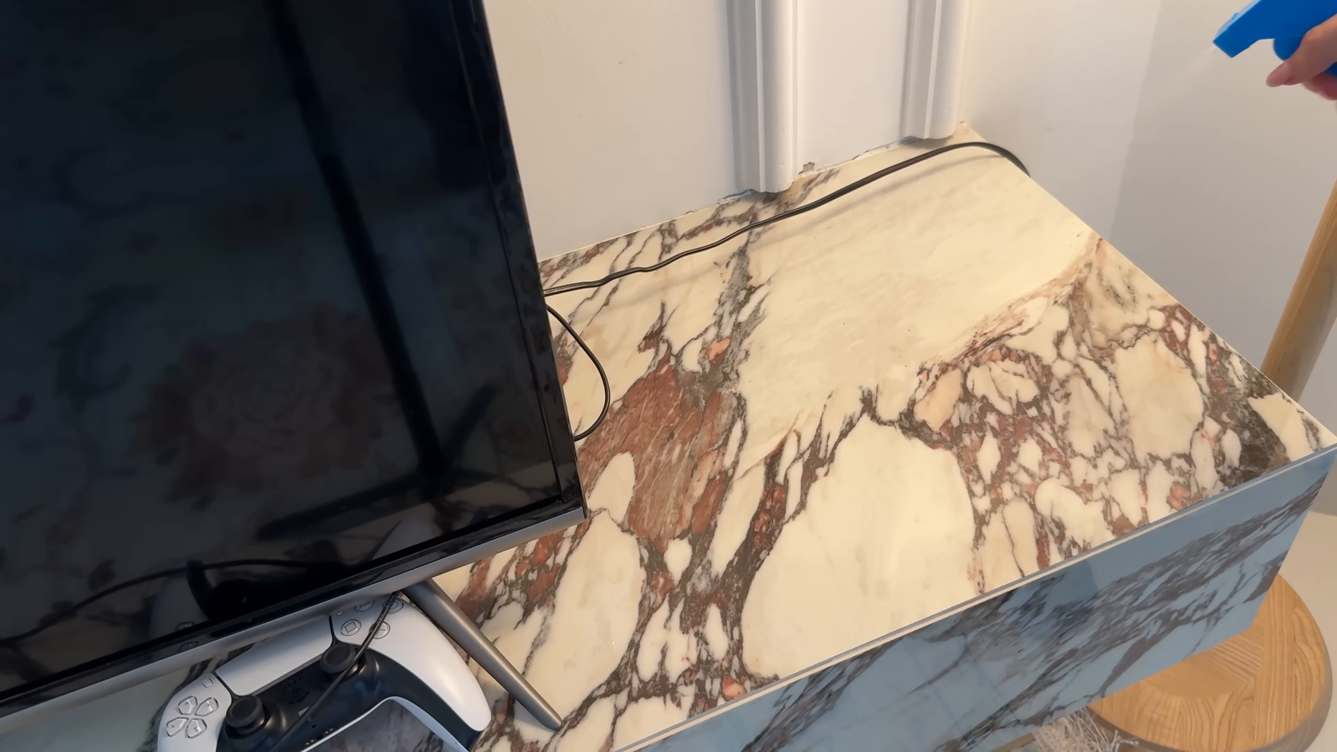 Maid service tidying a Carnegie Hill Manhattan bedroom