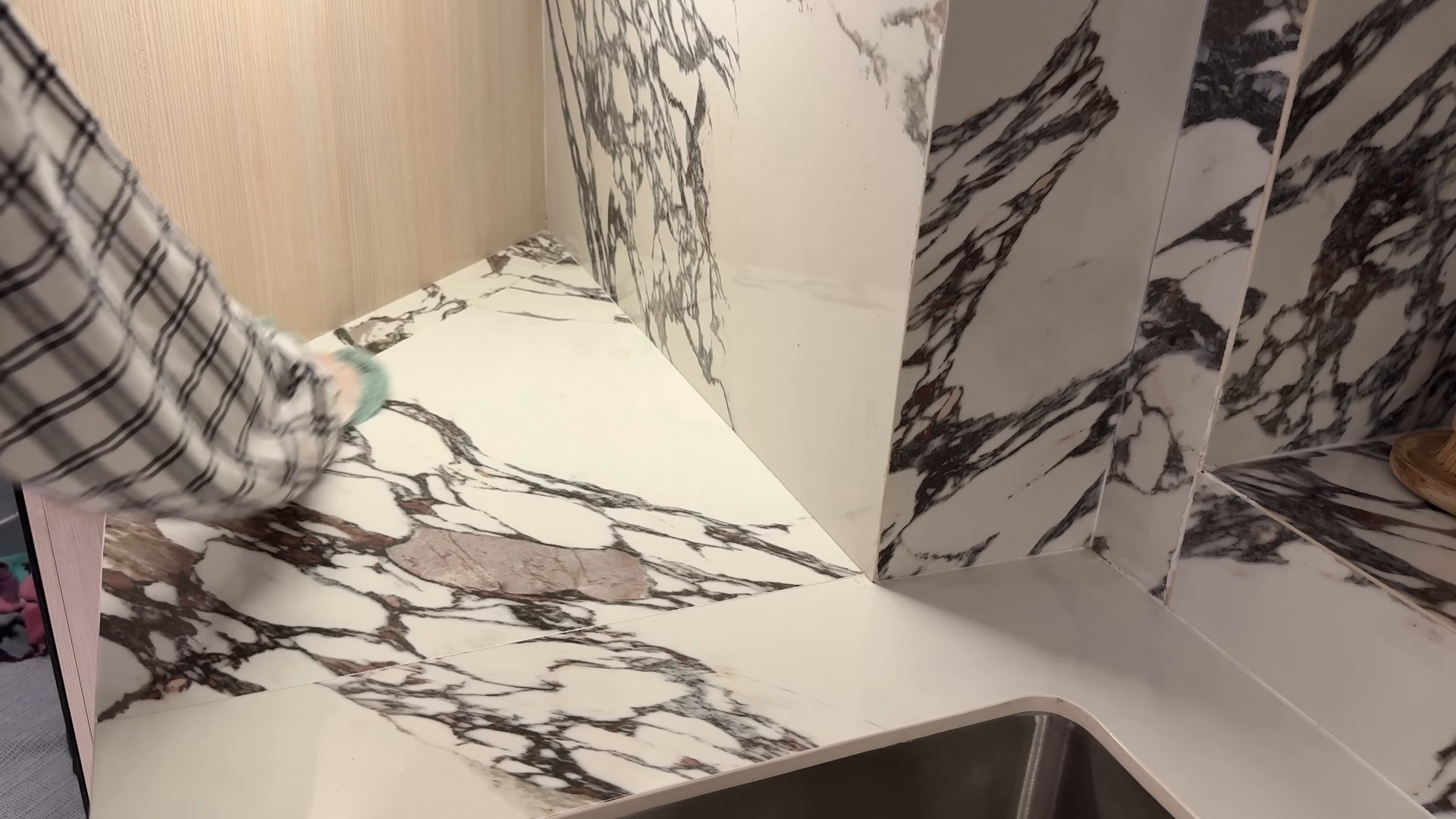 Deep cleaning service scrubbing a Ditmars Queens bathroom