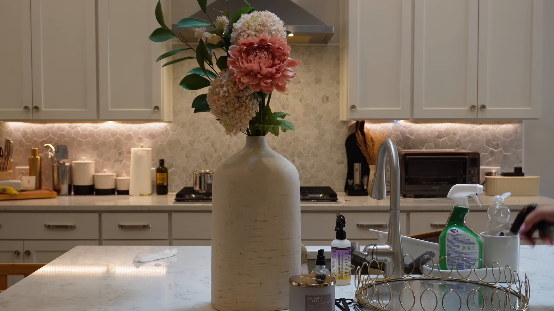 Deep cleaning team detailing a kitchen and refrigerator in a Downtown Brooklyn apartment