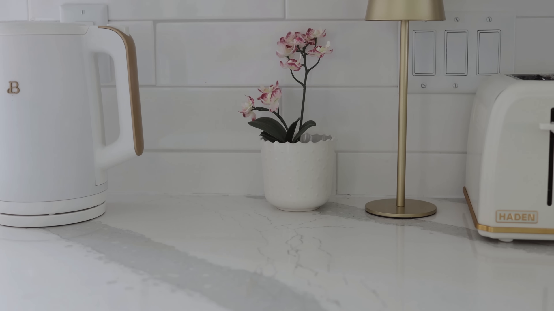 Housekeeping team finishing a standard basic cleaning in a Financial District kitchen