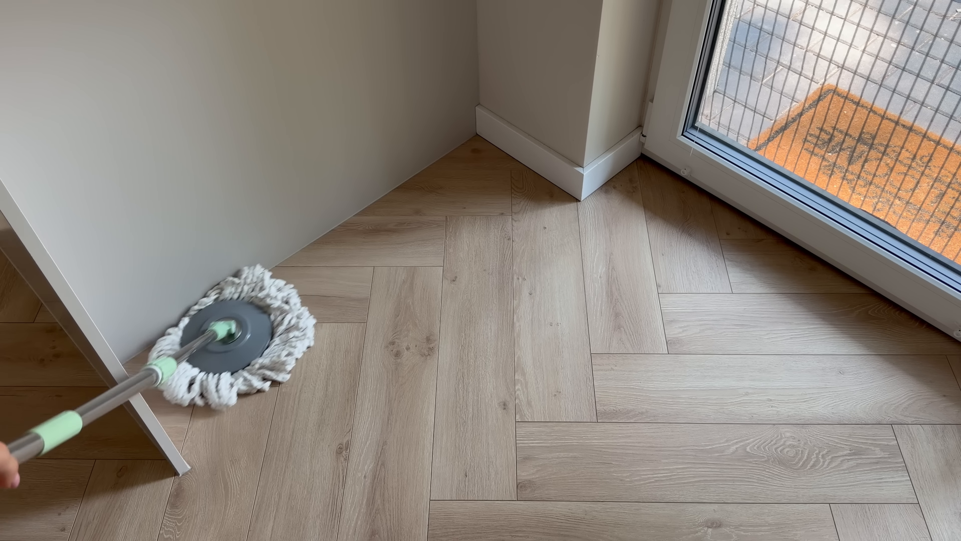 Recurring cleaning keeping the wood floors clean in a Fiske Terrace Brooklyn home