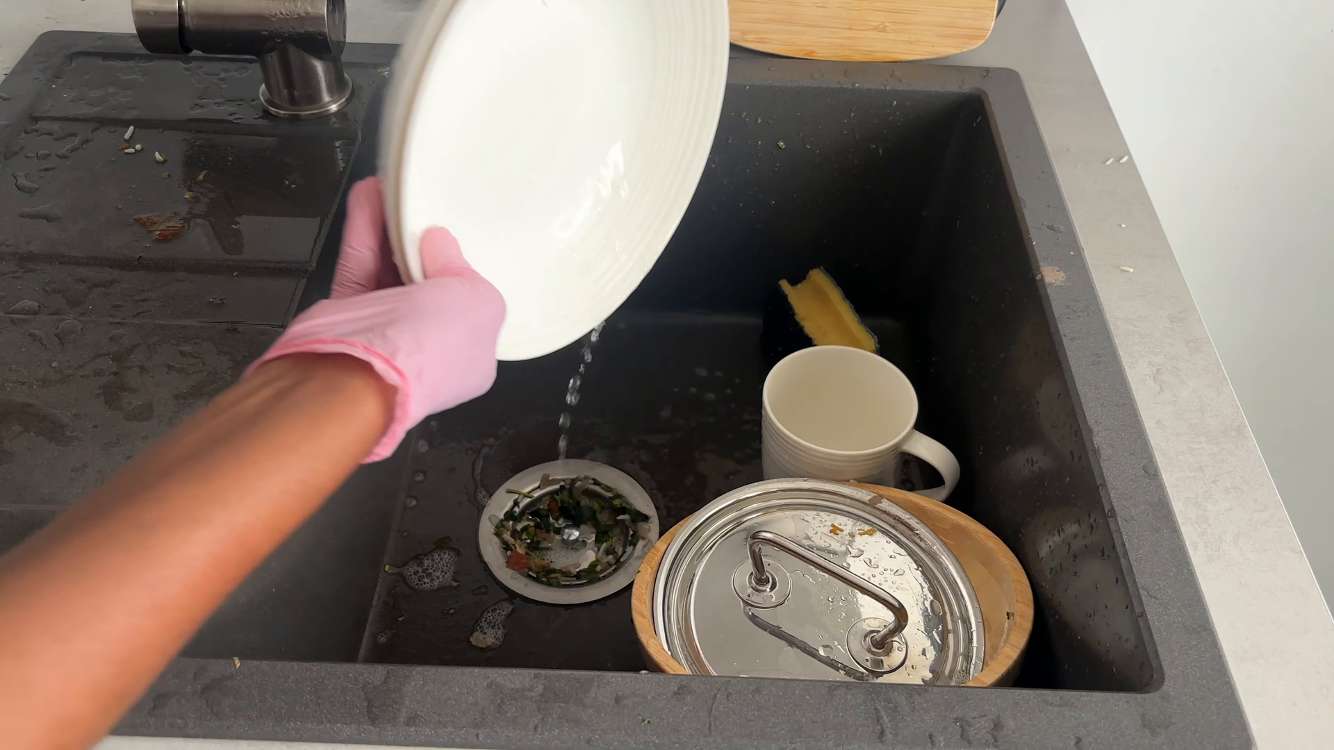 Cleaner making a Flatiron District apartment guest-ready before family visit
