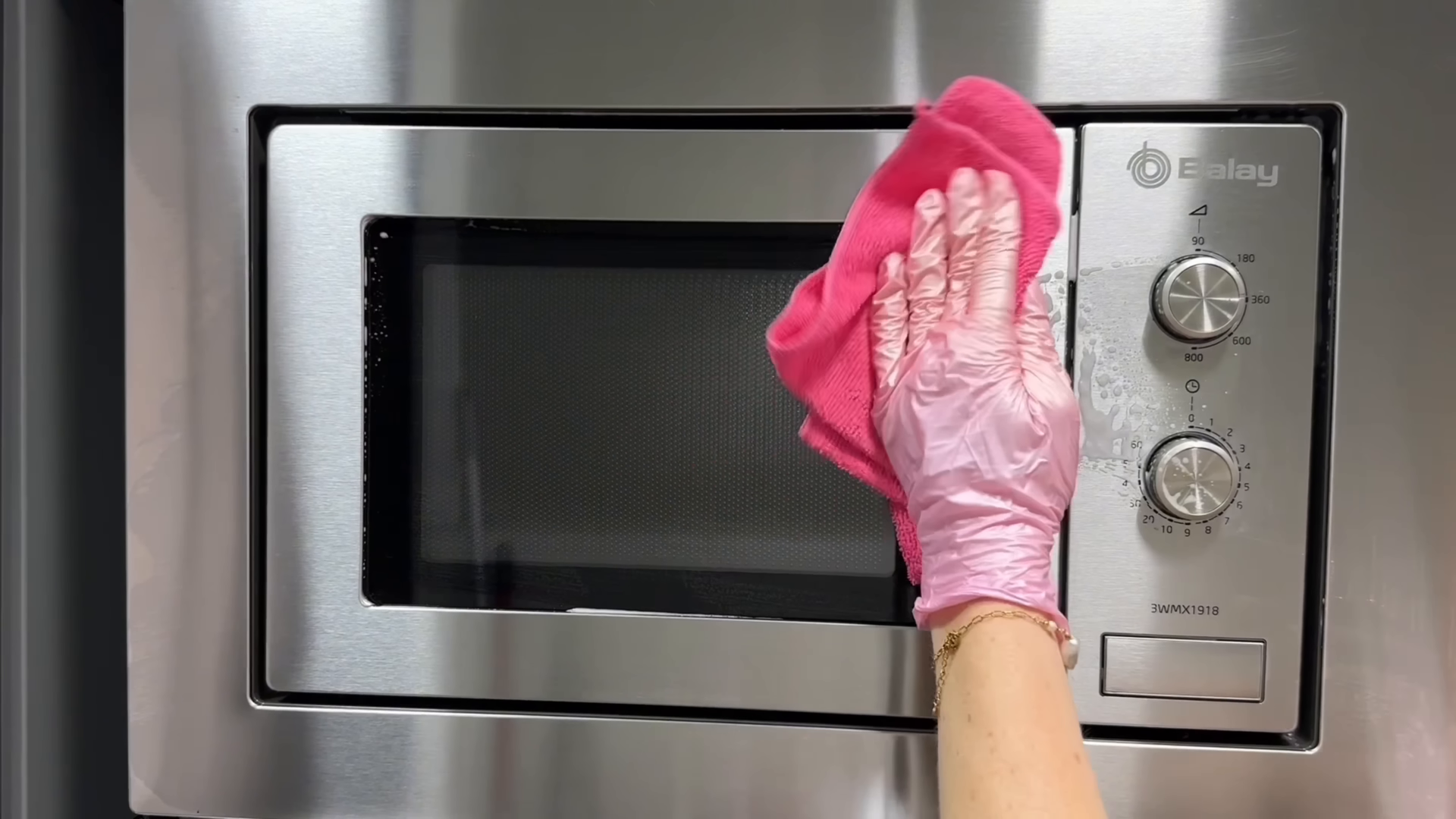 Cleaner finishing a move-in cleaning in a bright Gramercy Park Manhattan apartment