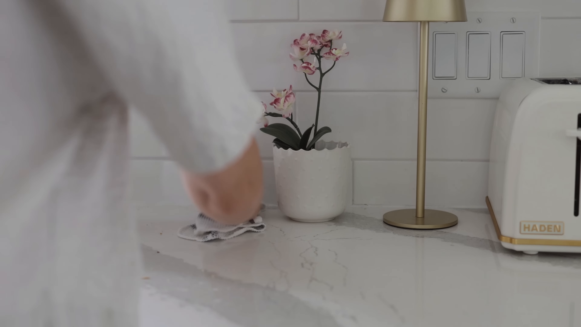House cleaner working through a Greenwich Village Manhattan living room