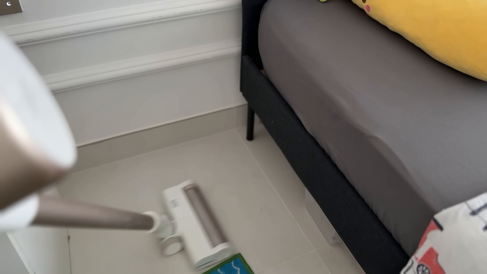 Cleaner finishing the hardwood floors in a bright Lincoln Square Manhattan apartment