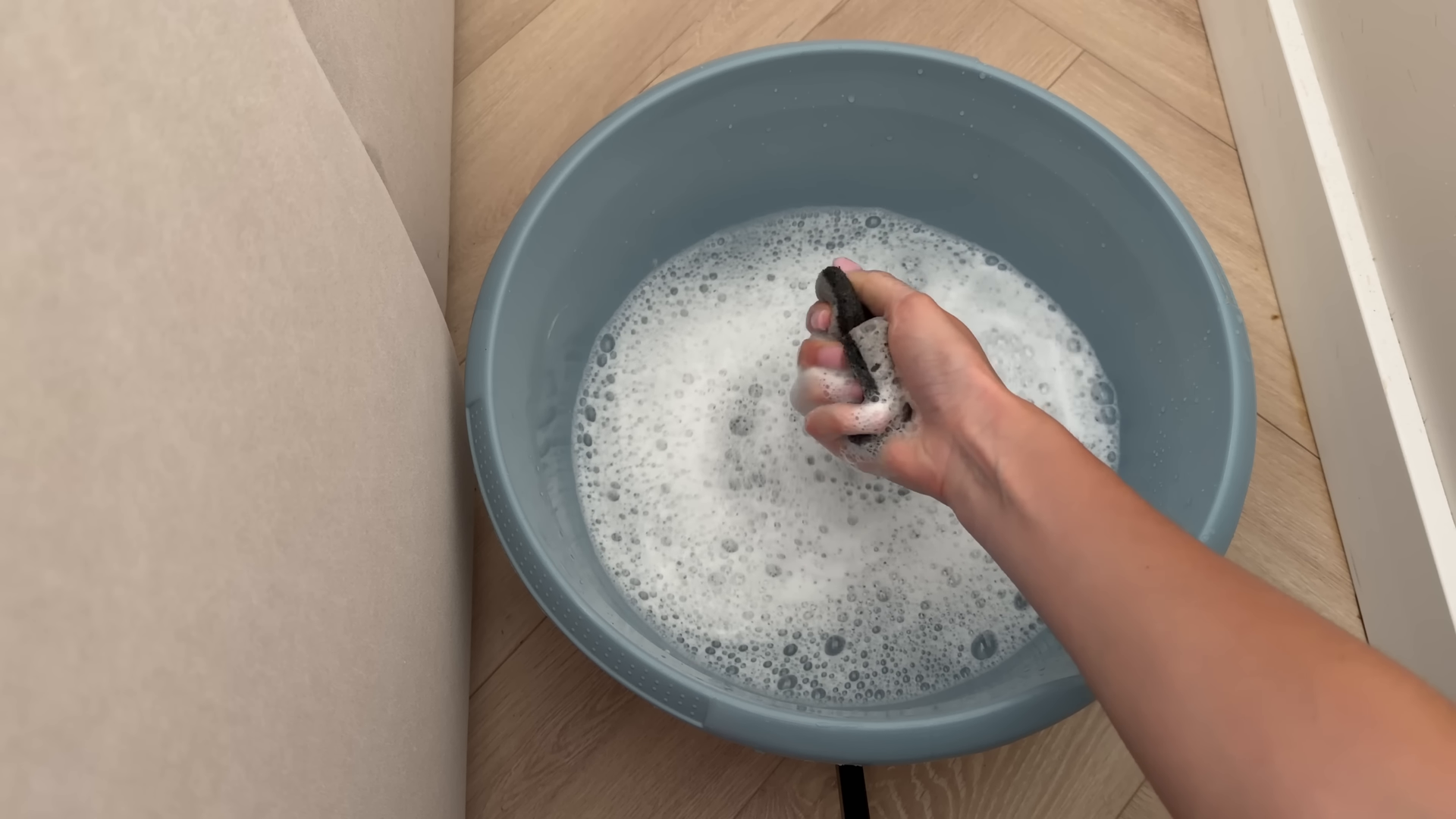 Cleaner making an Upper West Side area apartment guest-ready