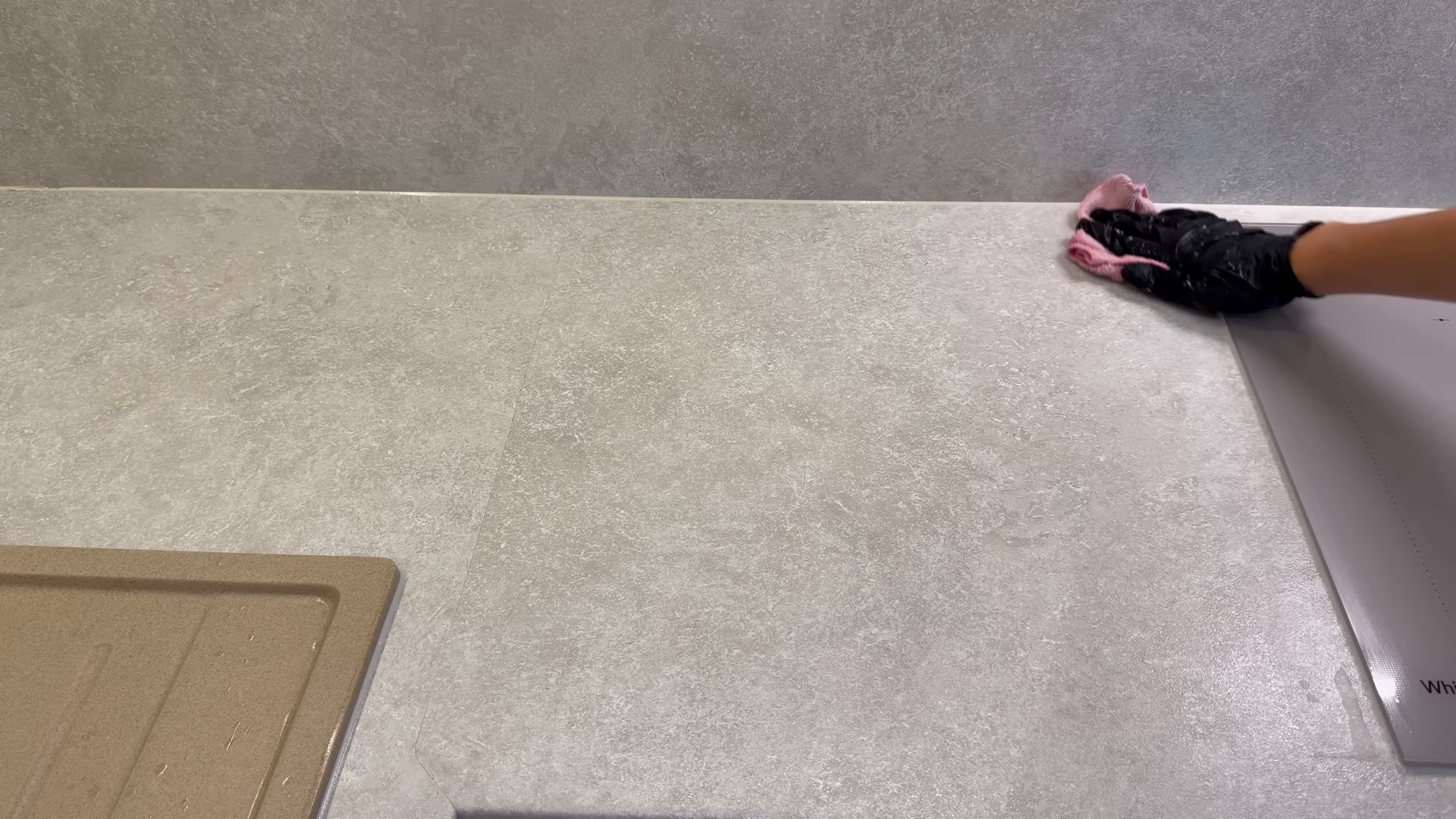 Cleaner detailing a Park Slope Brooklyn kitchen before family arrives