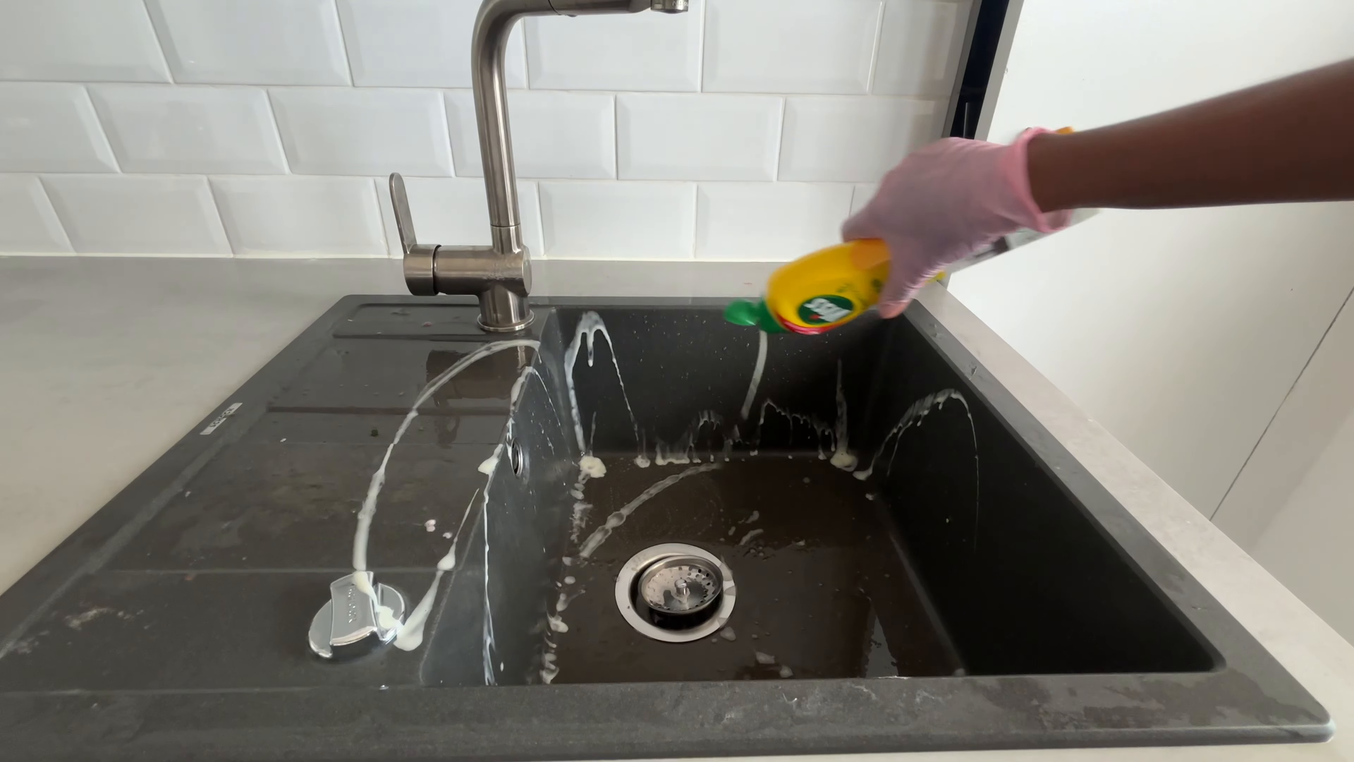 Maid service finishing a bright Soho Manhattan apartment
