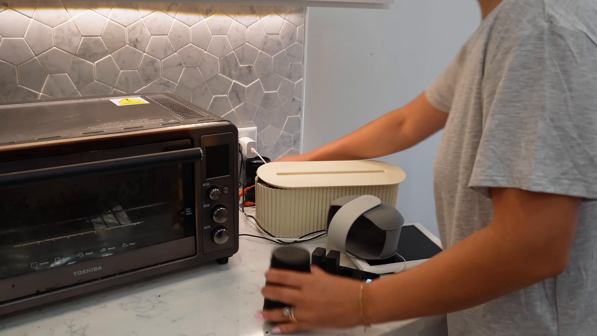 Maid service tidying an Upper East Side bedroom