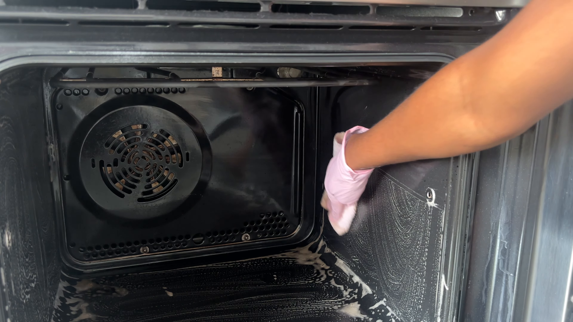 Apartment cleaning service prepping a Woodside Queens apartment for listing photos