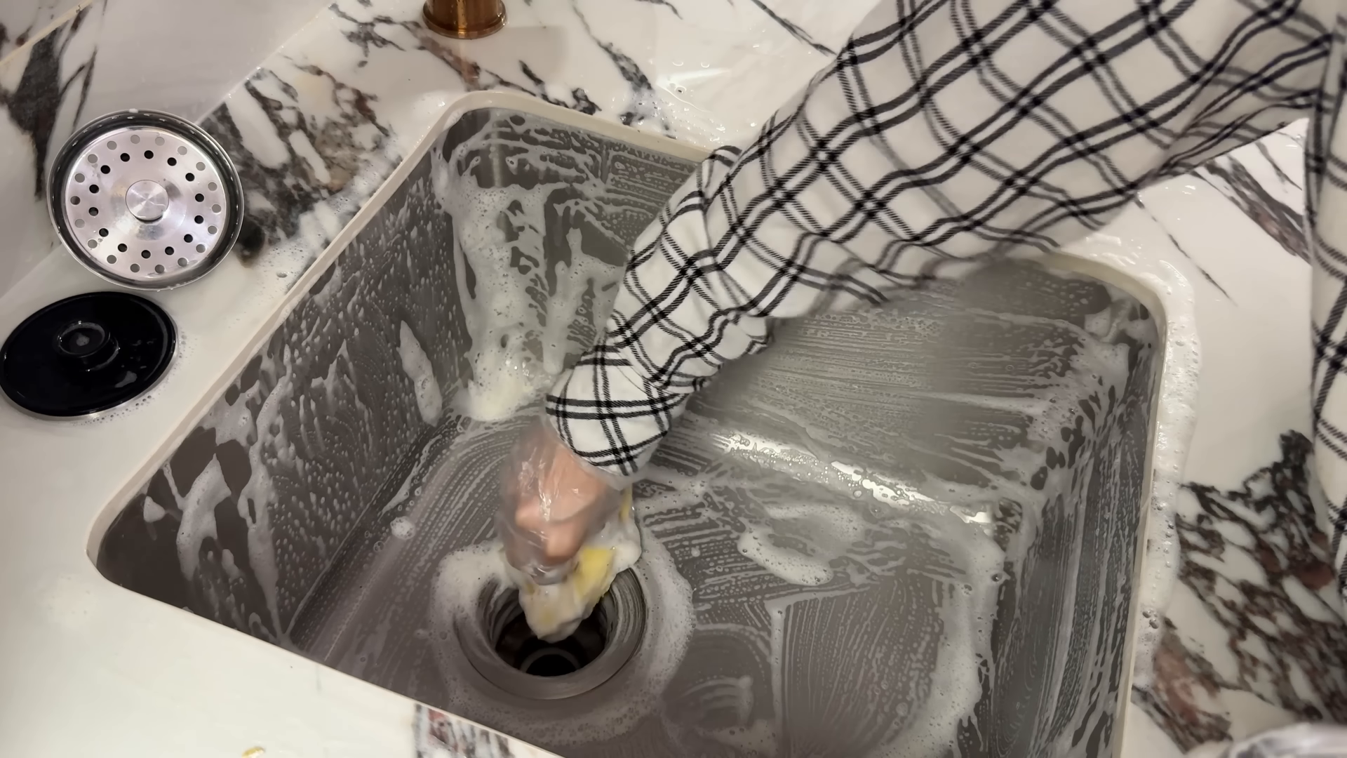 Housekeeper on a recurring cleaning visit in a Yorkville Manhattan apartment
