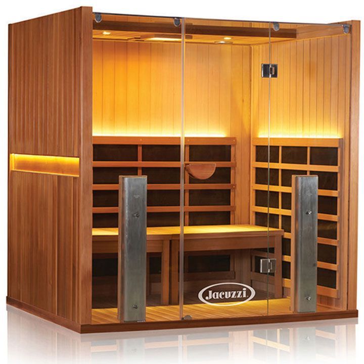 Wooden Jacuzzi sauna with glass door, interior lighting, and bench seating.
