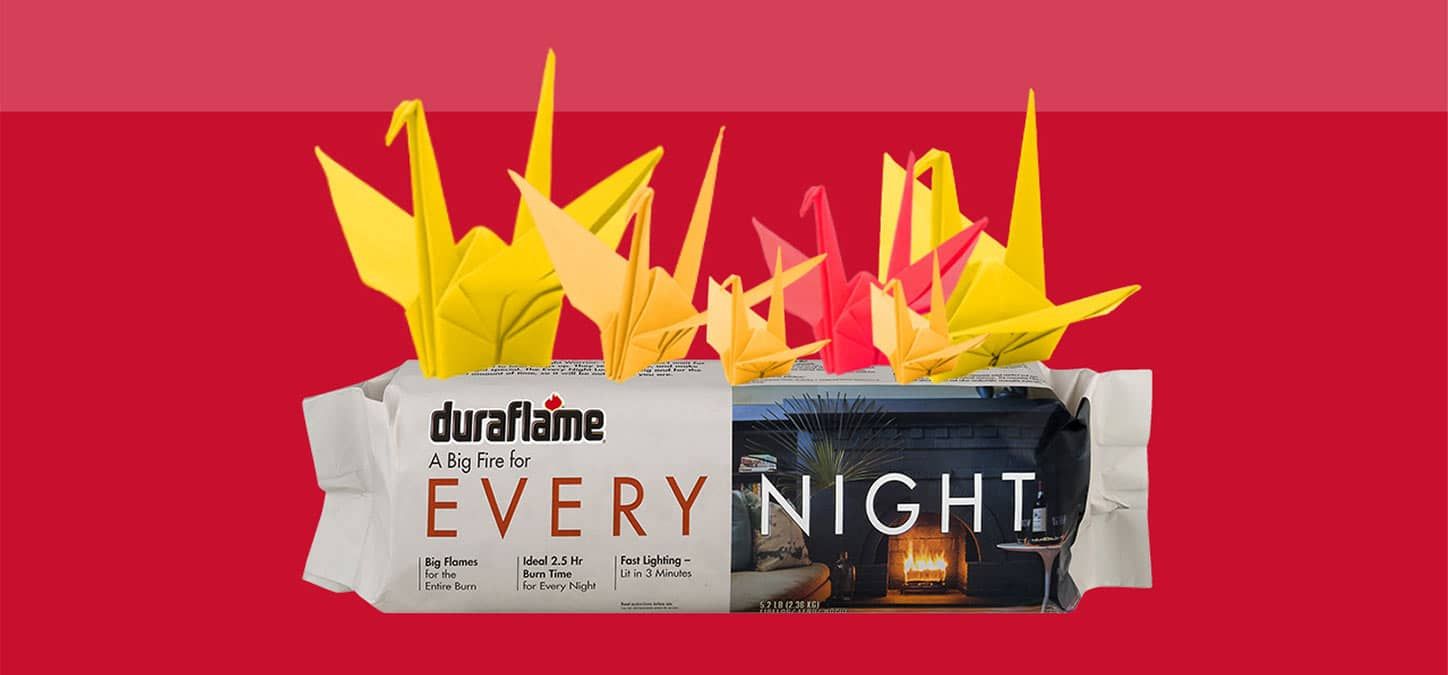 A package of duraflame every night with origami birds on top of it.