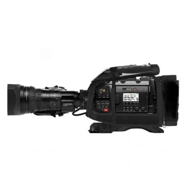 A black professional cinema camera with a lens attached, viewed from the side against a plain white background.
