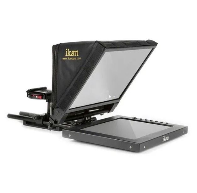 A black, professional teleprompter with a reflective glass panel angled above a horizontal tablet display on a mount.