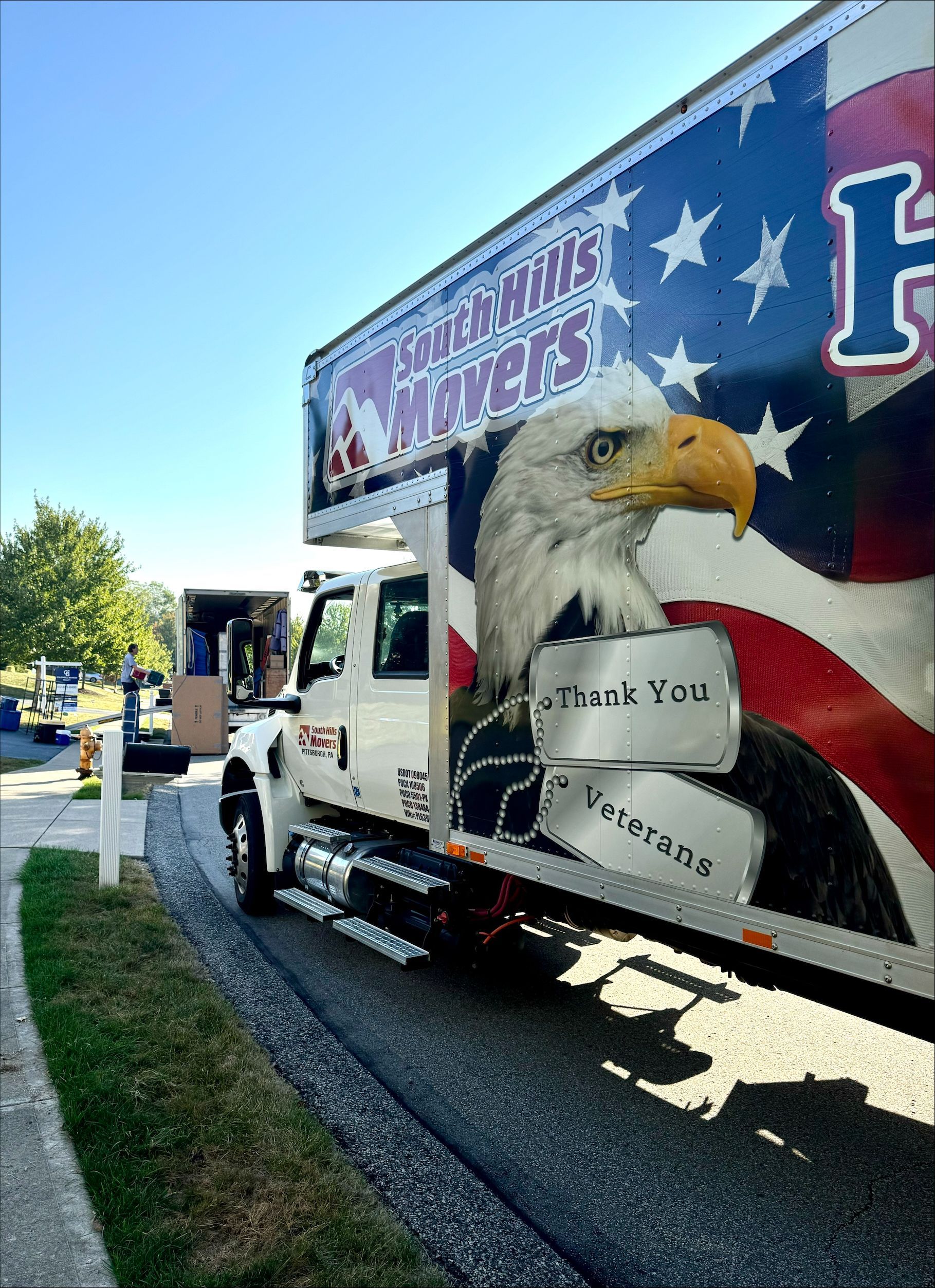 Moving truck with American flag and eagle graphic,