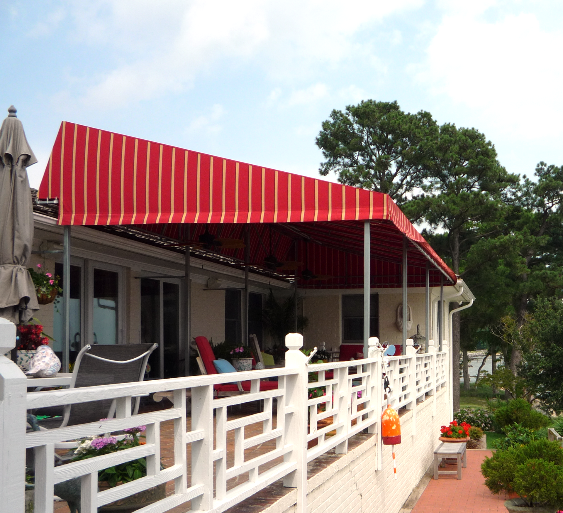 House with Blue Awning — Norfolk, VA — Hustead's Canvas Creations