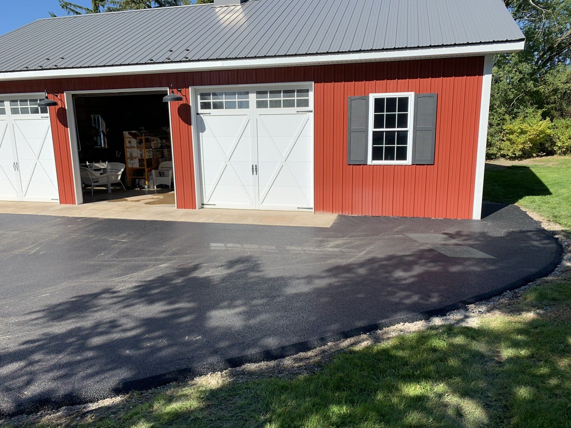 Paved Infront Of The Garage — Finger Lakes — Cayuga Excavating & Paving Paved Infront Of The Garage — Finger Lakes — Cayuga Excavating & Paving