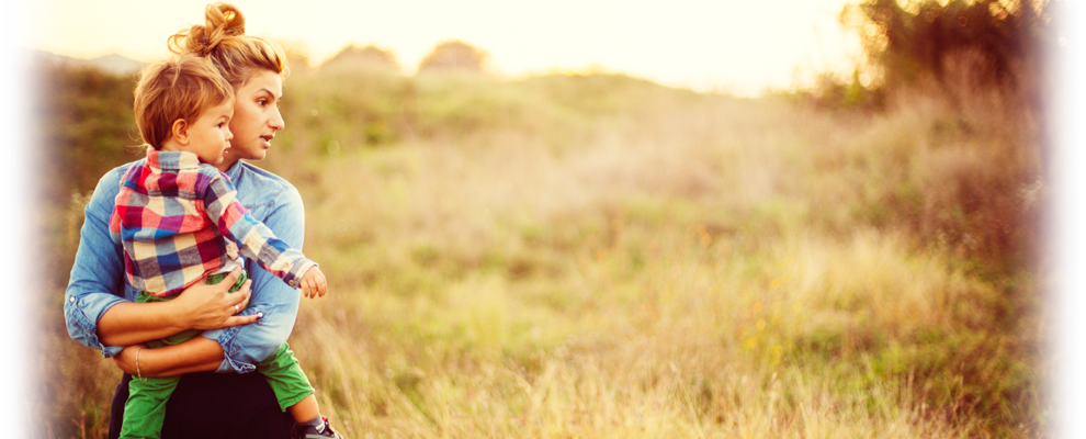mother and son in field