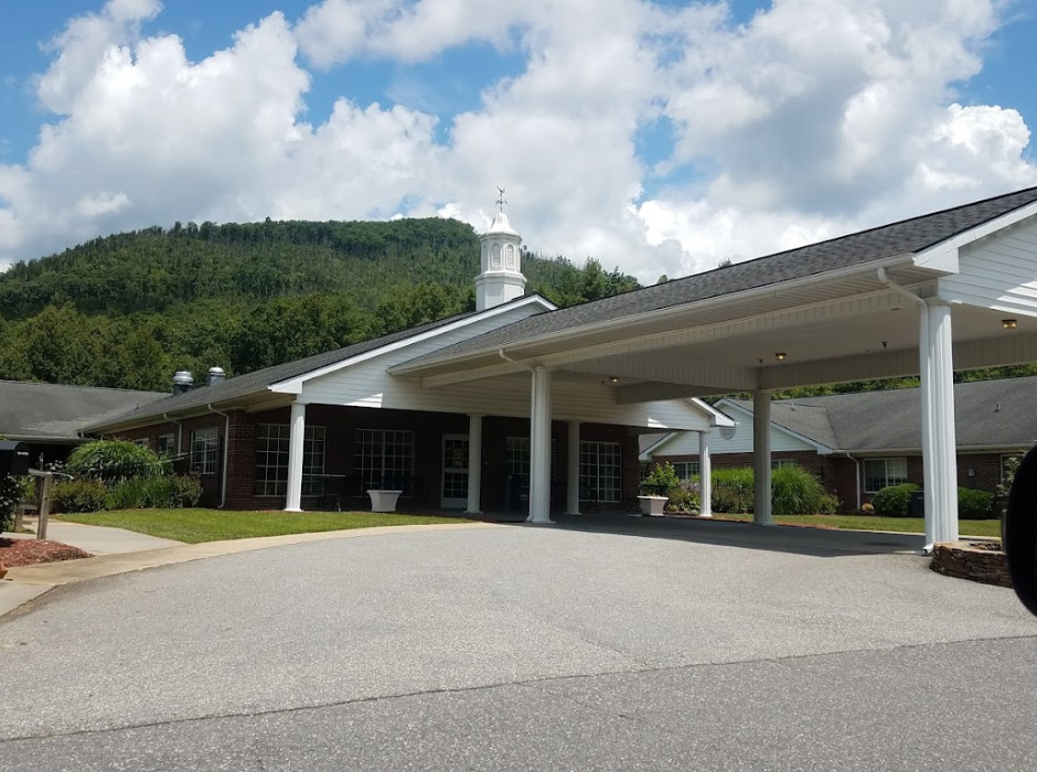 Man sitting at desk with laptop 