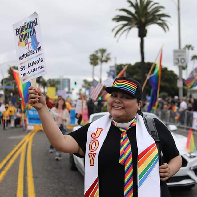 Our former associate rector proudly marching in the Long Beach Pride Parade | Madre Nancy en el desfile del Orgullo LGBTQ+