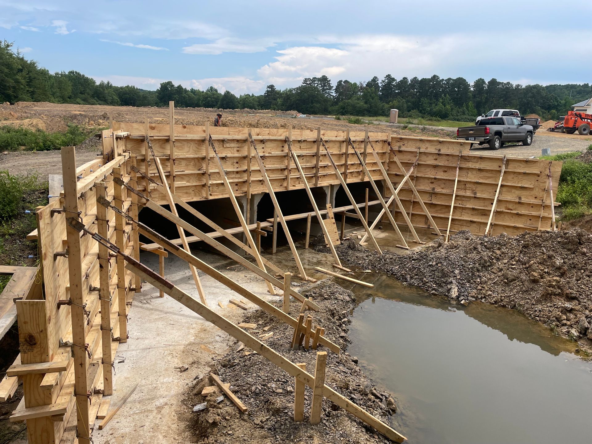 A bridge is being built over a body of water.