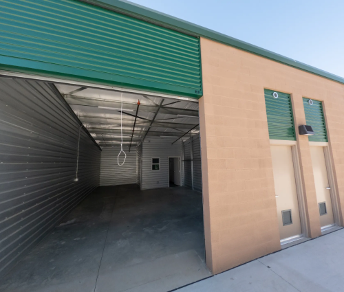 Empty warehouse space with bay door to outside