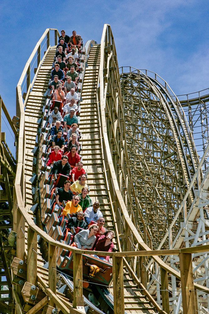 High-speed roller coaster at Six Flags capturing the excitement of a steep drop and adrenaline-fille