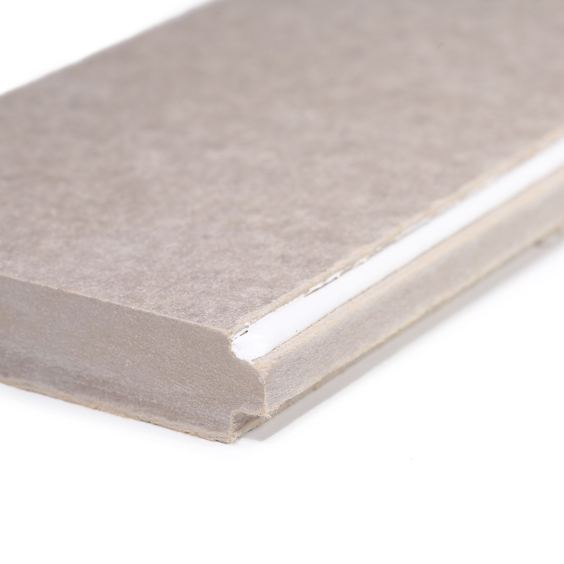 A close up of a piece of DryBloc (male side)