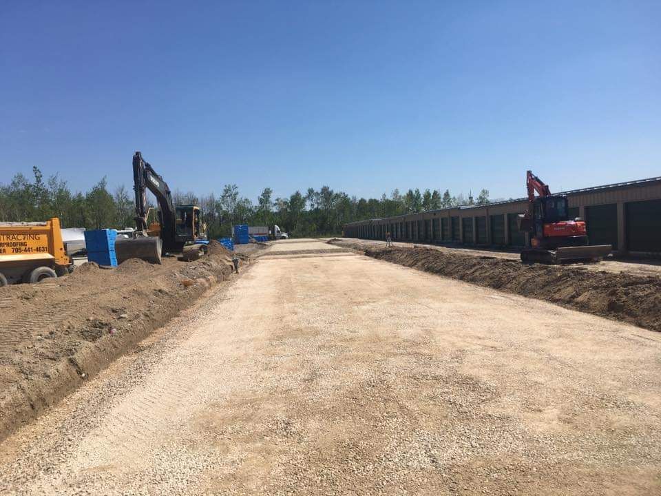A construction site with a lot of machinery on it.
