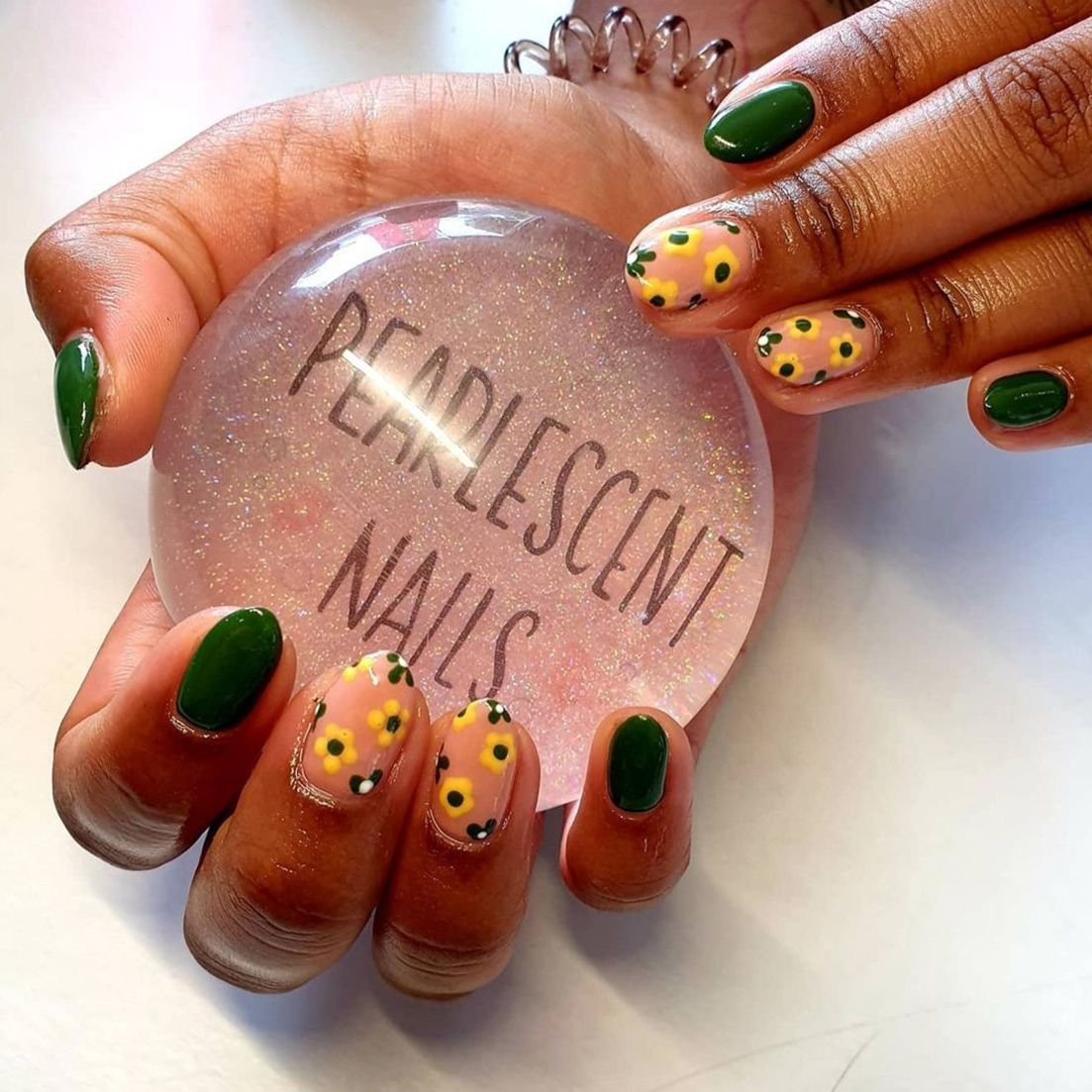 BIAB nail overlay with green and yellow flowers