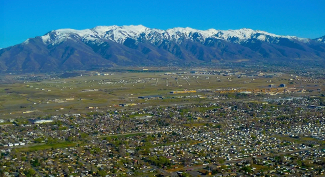 Weekly maid service cleaning a kitchen in a Salt Lake City home