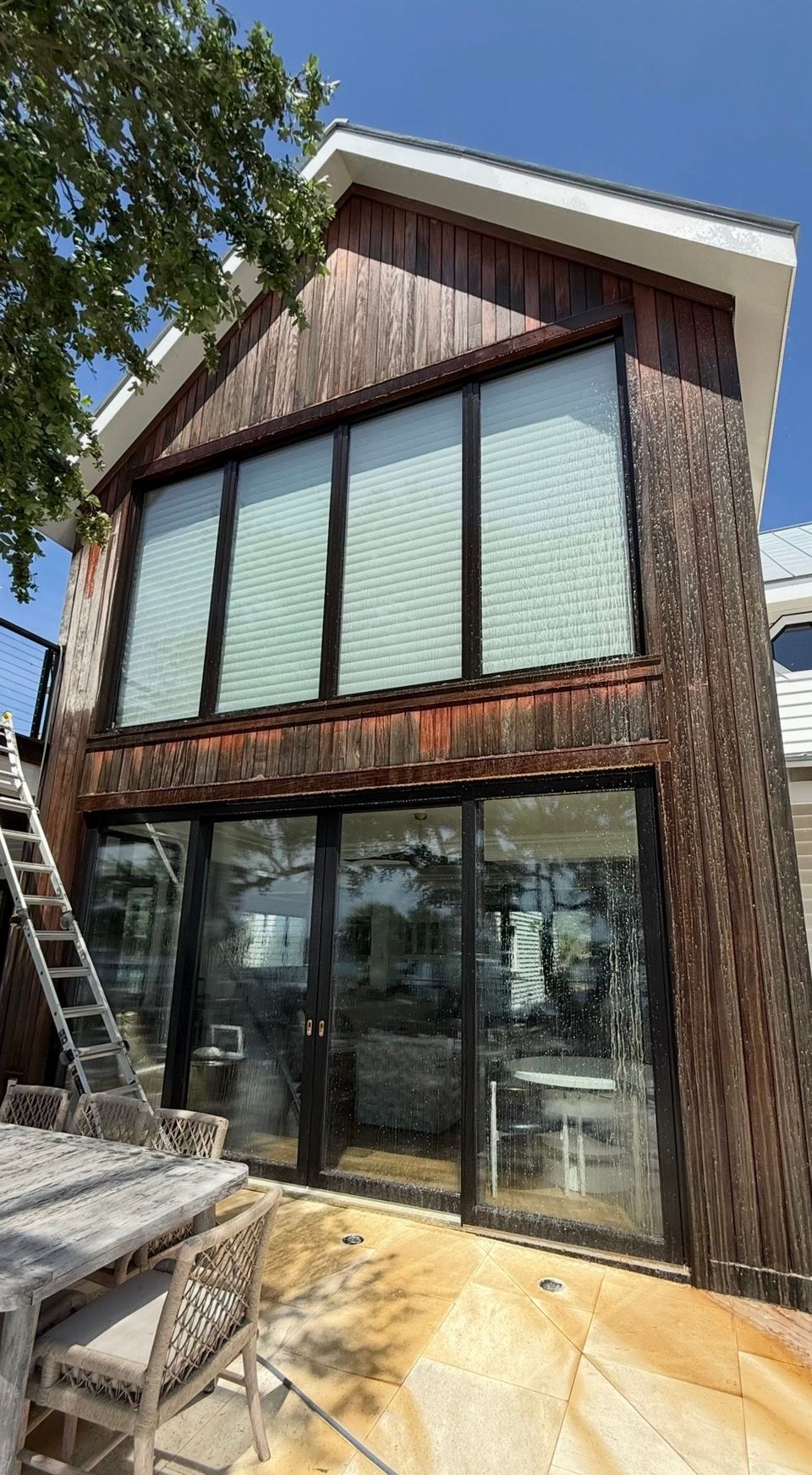 Before — weathered wood siding