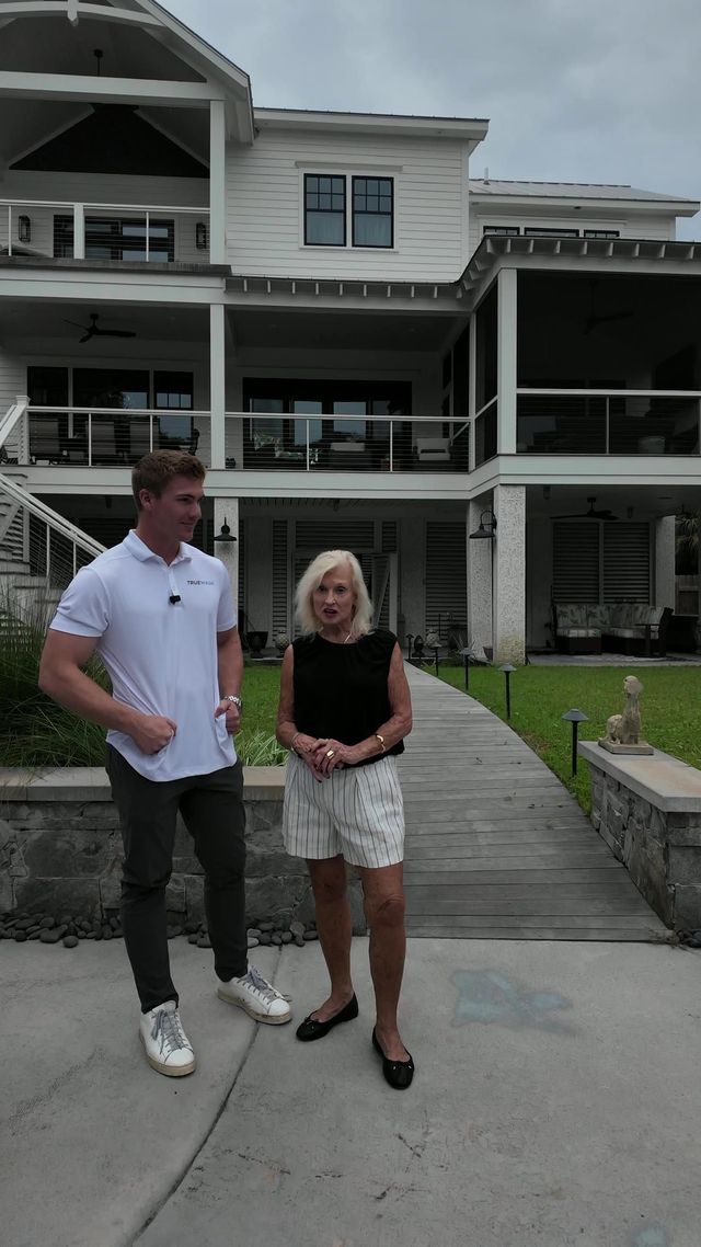 Charlie and Paulette in front of her Folly Beach home