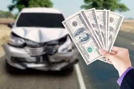 A white Car white money in front.