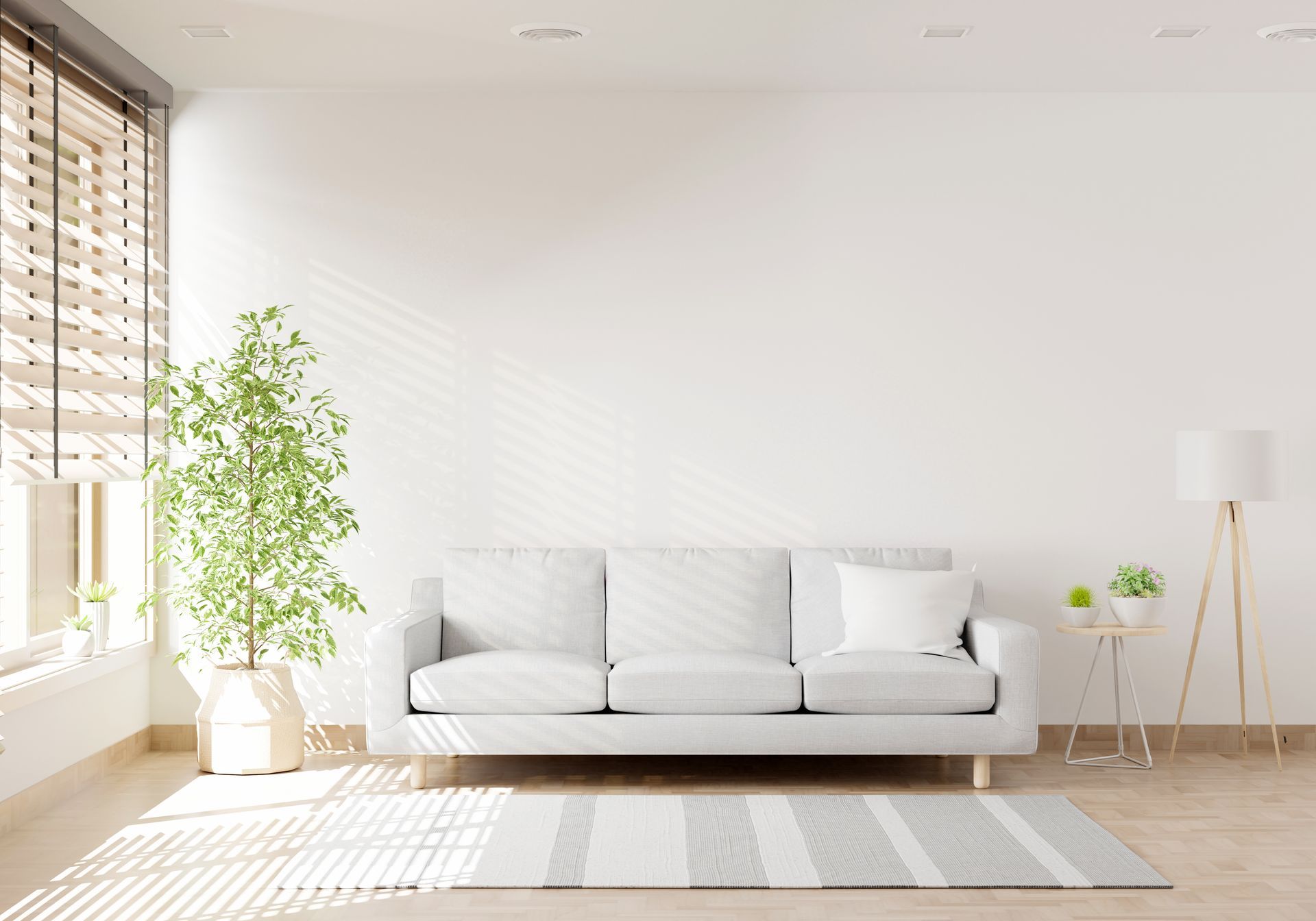 Serenity 23 - A living room with a white couch, carpet, lamp and window.