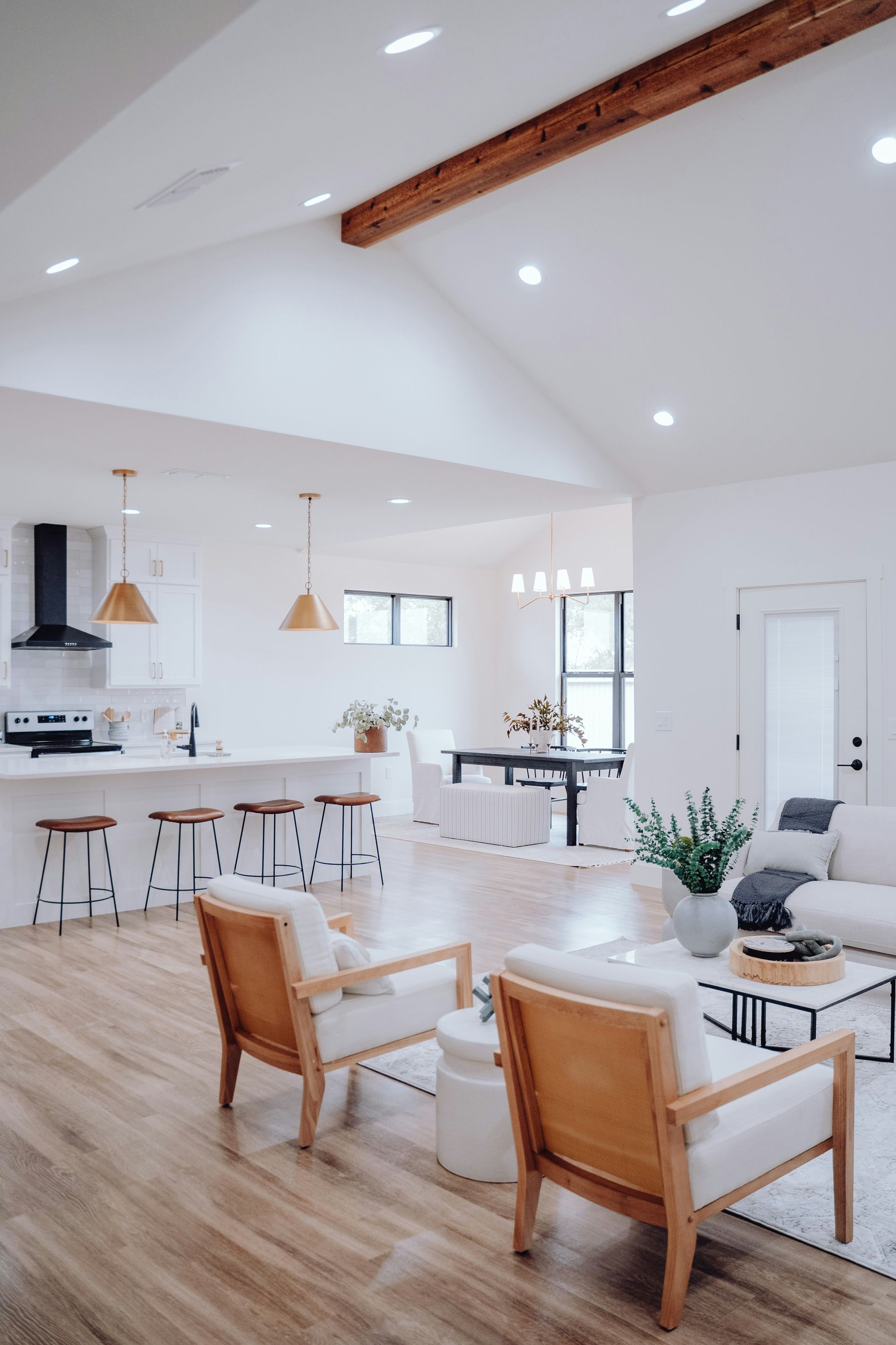 Ridge 4 - A living room with a couch, chairs, and a coffee table.