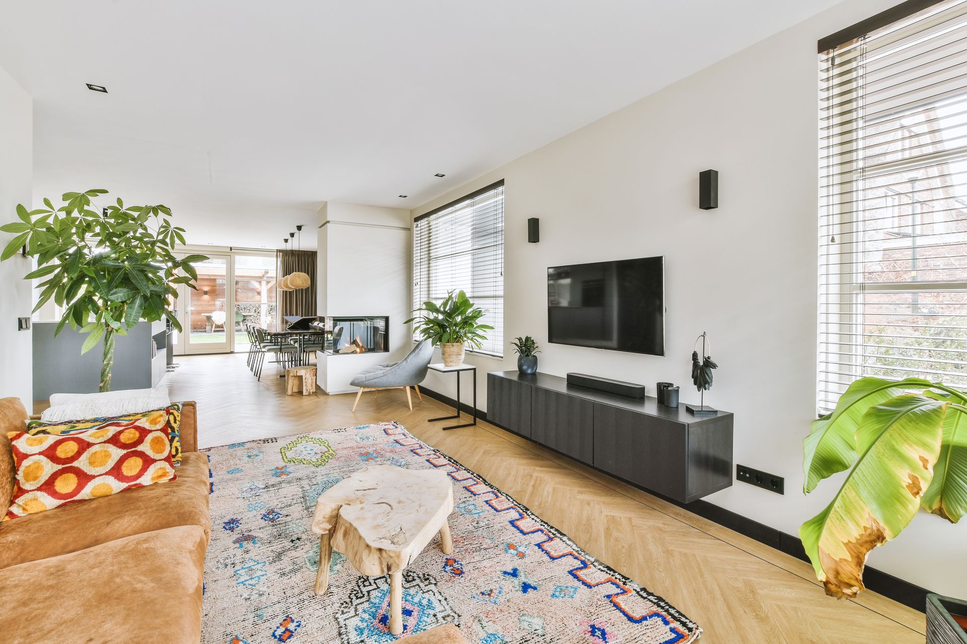 Cape 19 - A living room with a couch, chairs, and a coffee table.