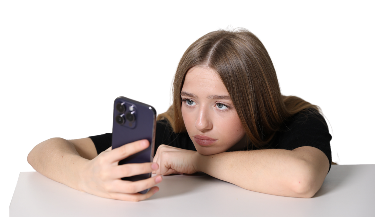 Girl glued to her cell phone.