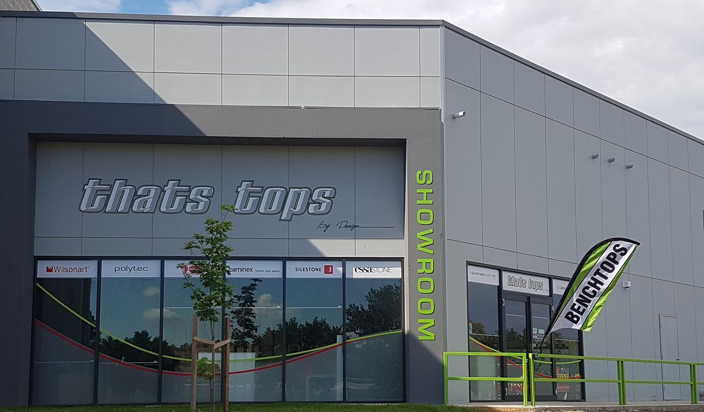A White Truck Is Parked in Front of A Building — Thats Tops by Design in Taminda, NSW