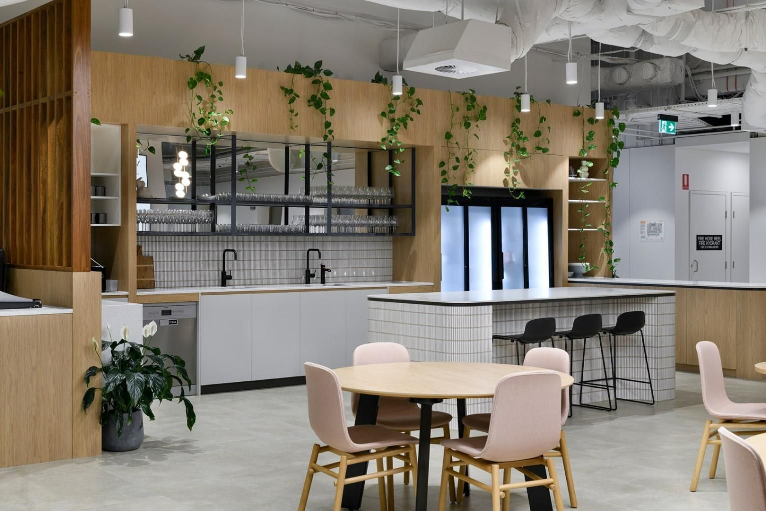 A Kitchen with A Table and Chairs in It — Thats Tops by Design in Taminda, NSW