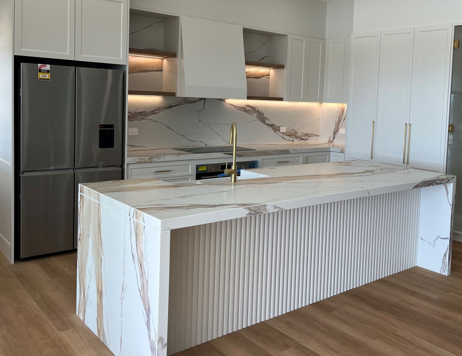 A Kitchen with A Sink, Stove, Table and Chairs — Thats Tops by Design in Taminda, NSW