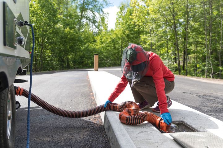 Woman Is Emptying The Sewer — Jackson, WI — H & H Quality Removal