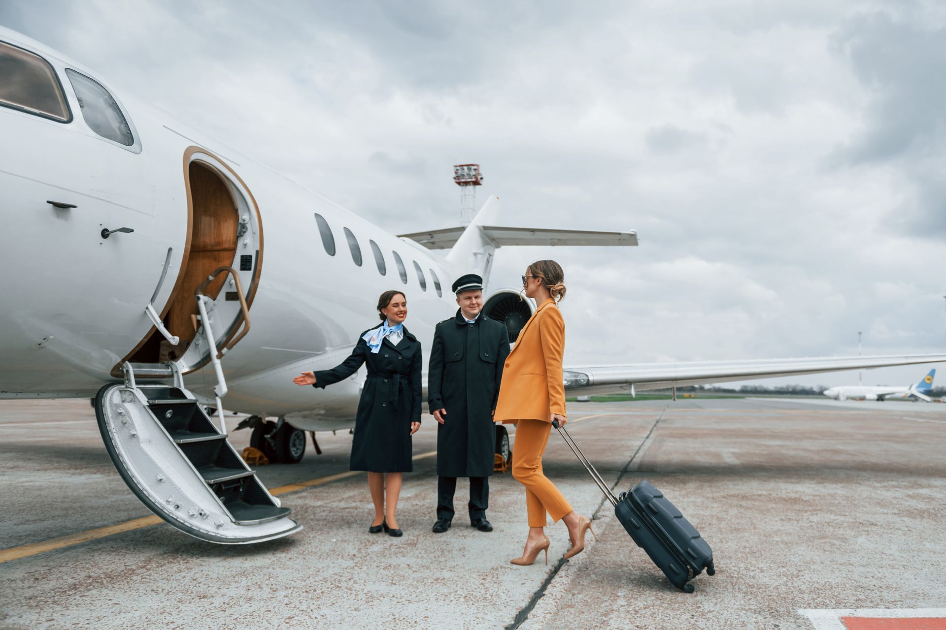 lady boarding private jet