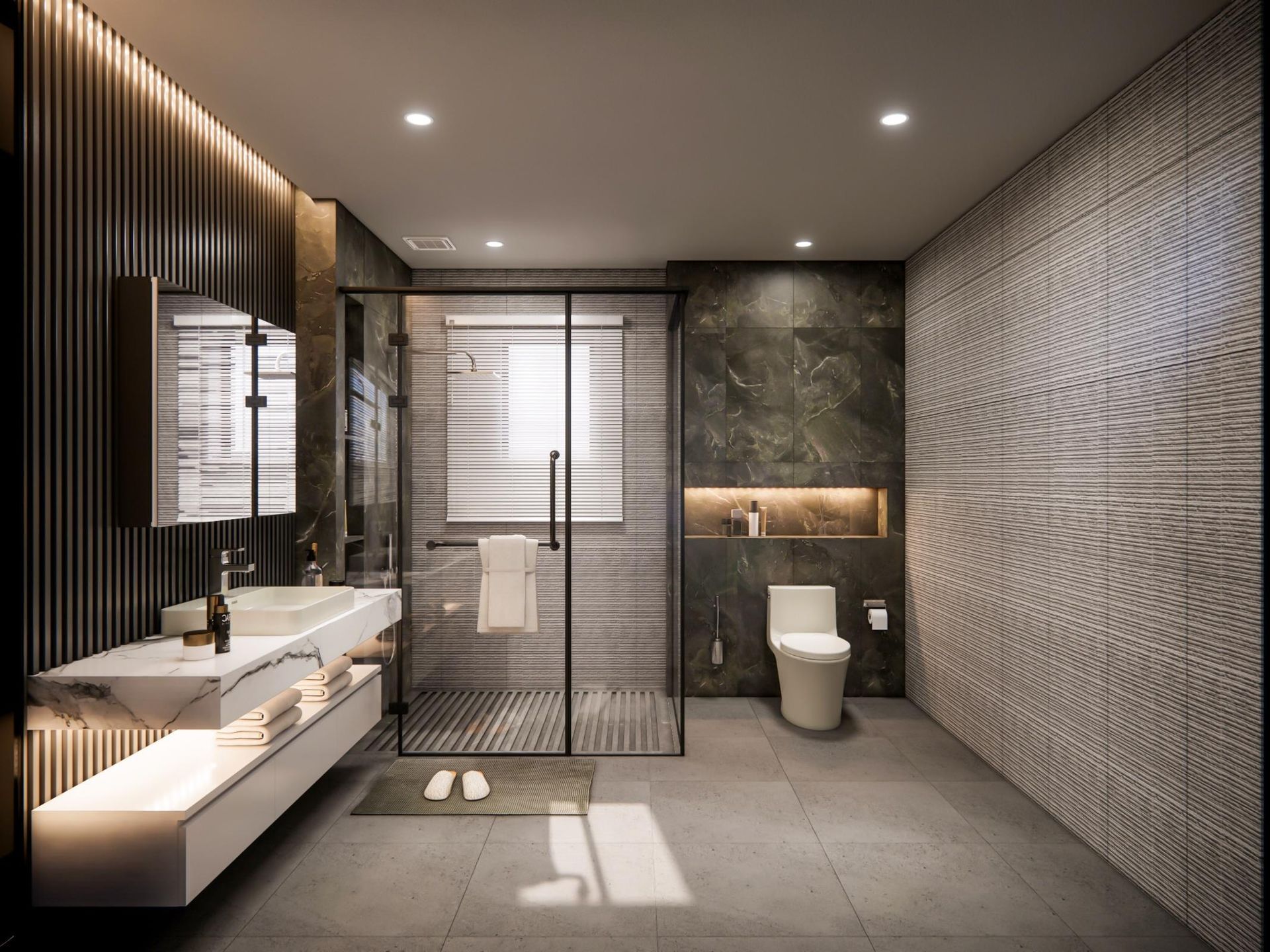 A bathroom with a toilet, sink, mirror, and walk-in shower.