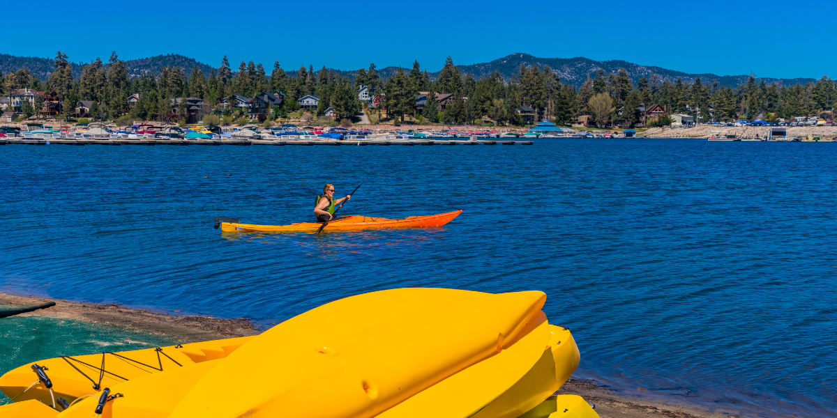 Kayaker paddling on Big Bear Lake Kayaker paddling on Big Bear Lake