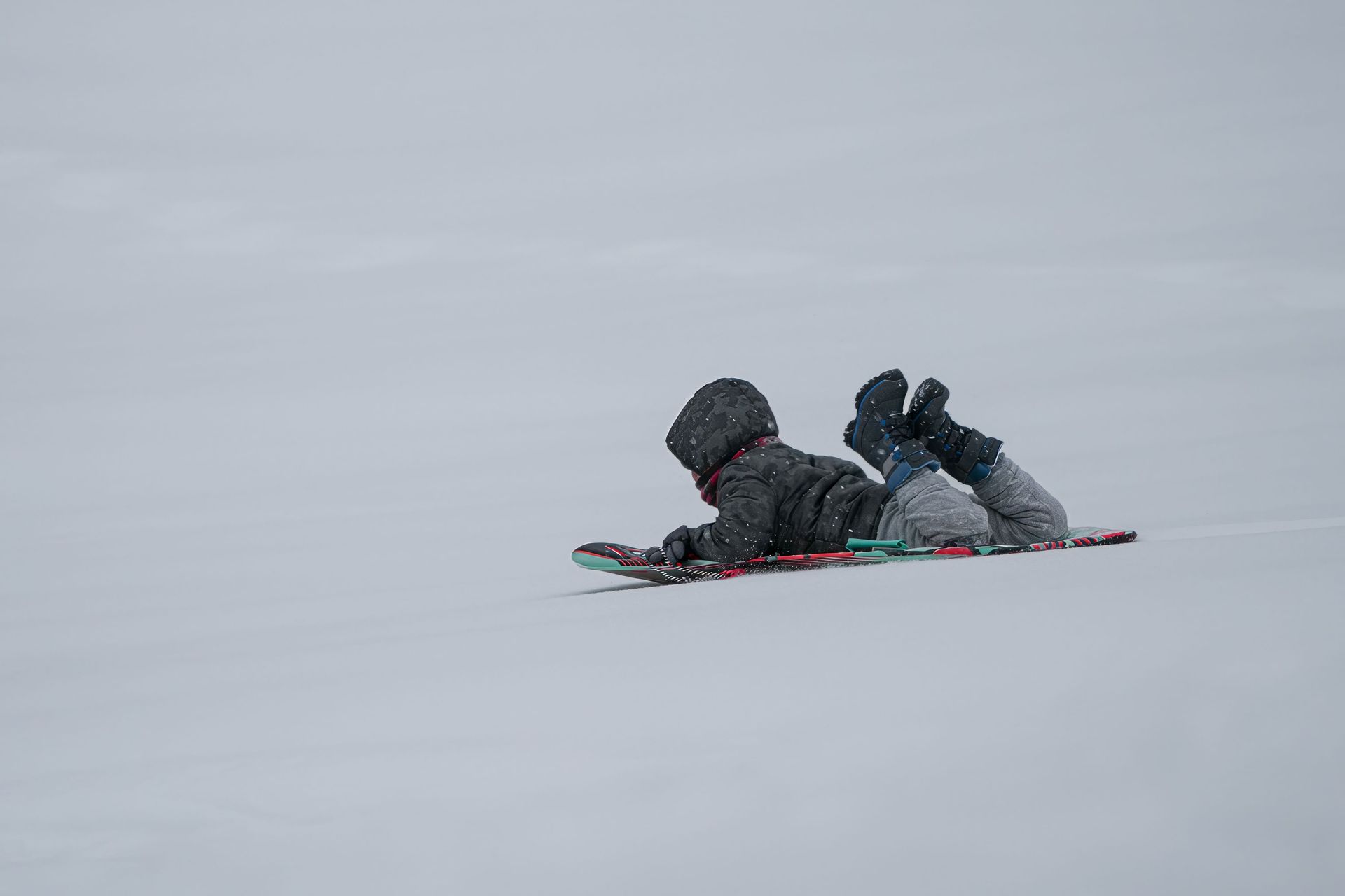 Family heading out for a snow-play day