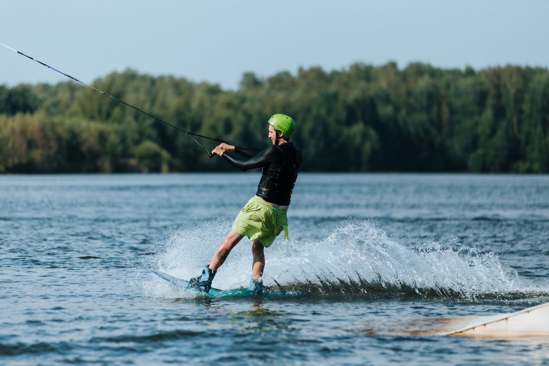 Wakeboarding behind a boat on Big Bear Lake