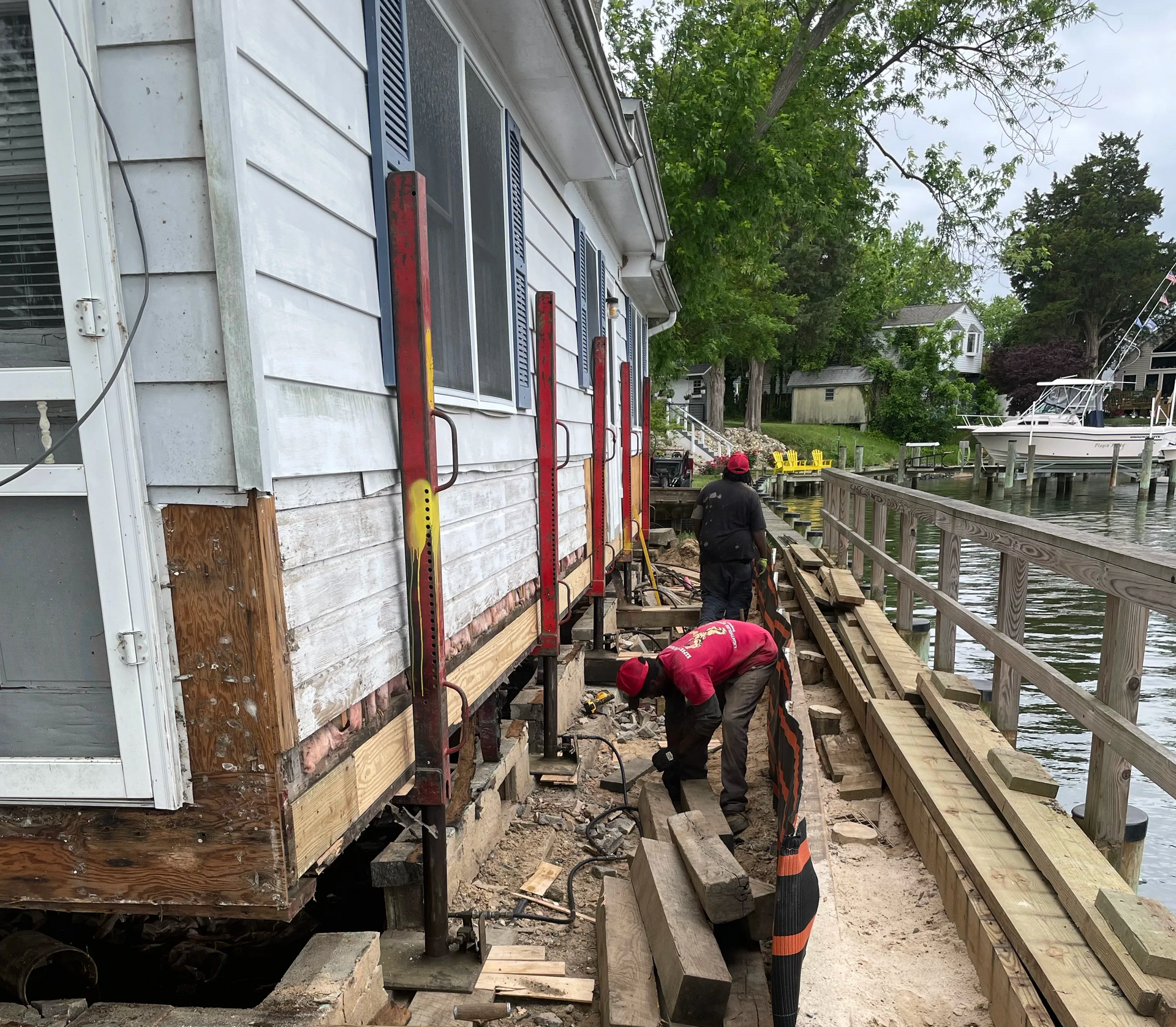 Chris Turner crew elevating cottage on Solmons Island MD