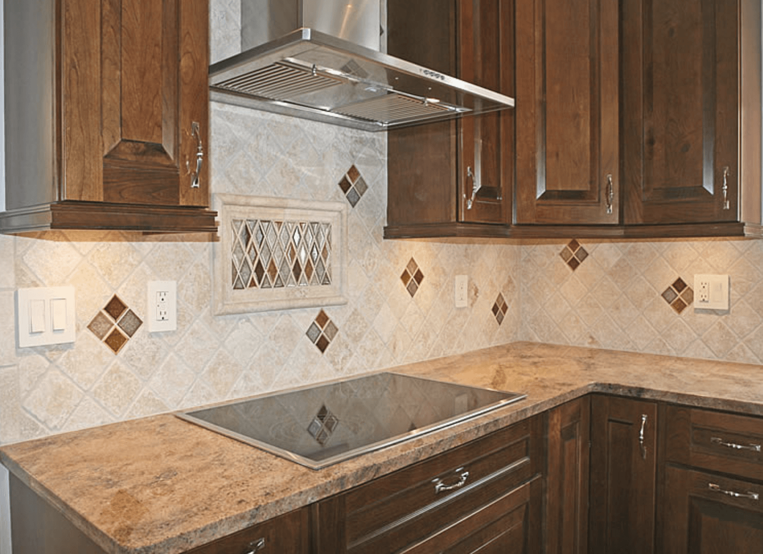 A kitchen with wooden cabinets and a stove top oven